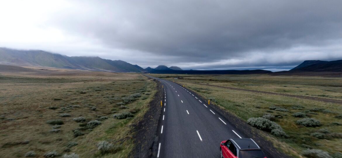 car driving along country road