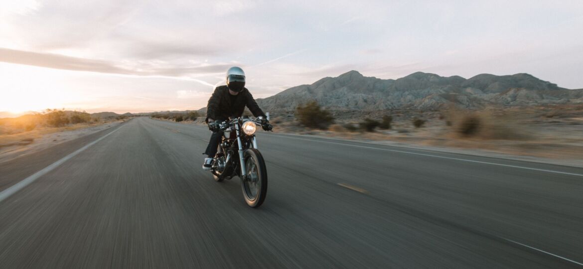 motorcycle rider driving in the countryside