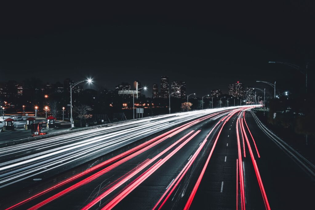 timelapse photograph of traffic on highway