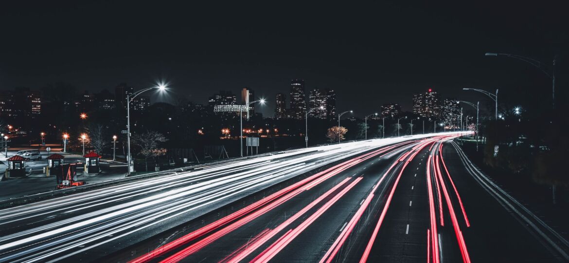 timelapse photograph of traffic on highway