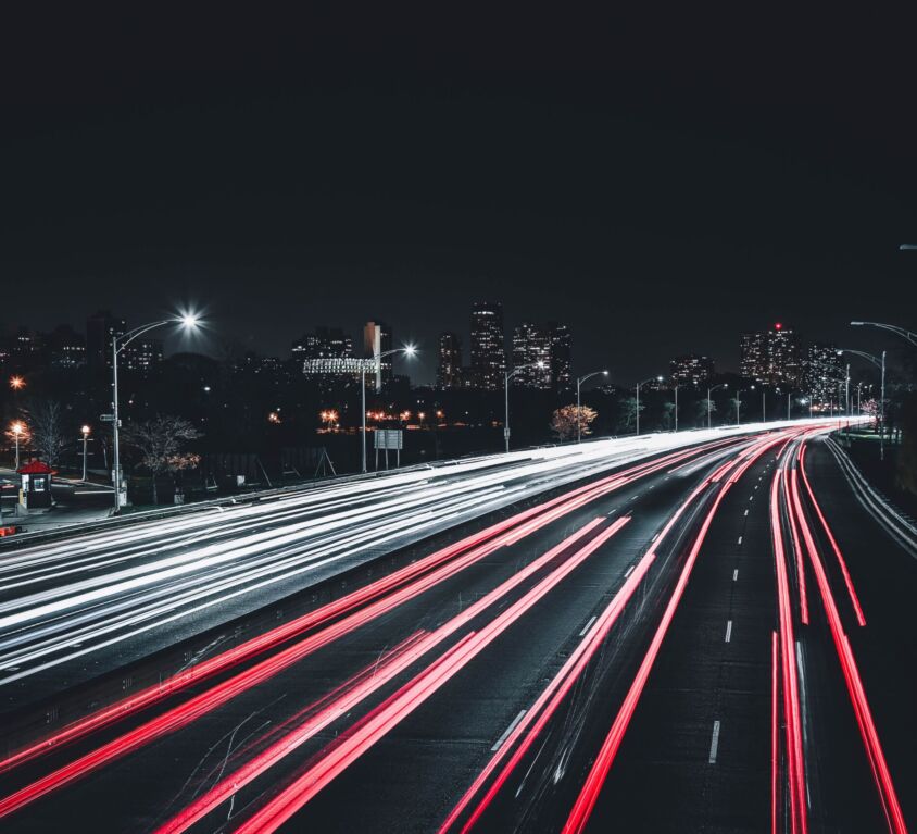 timelapse photograph of traffic on highway