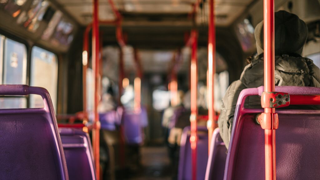 Interior view of passengers sitting on a bus