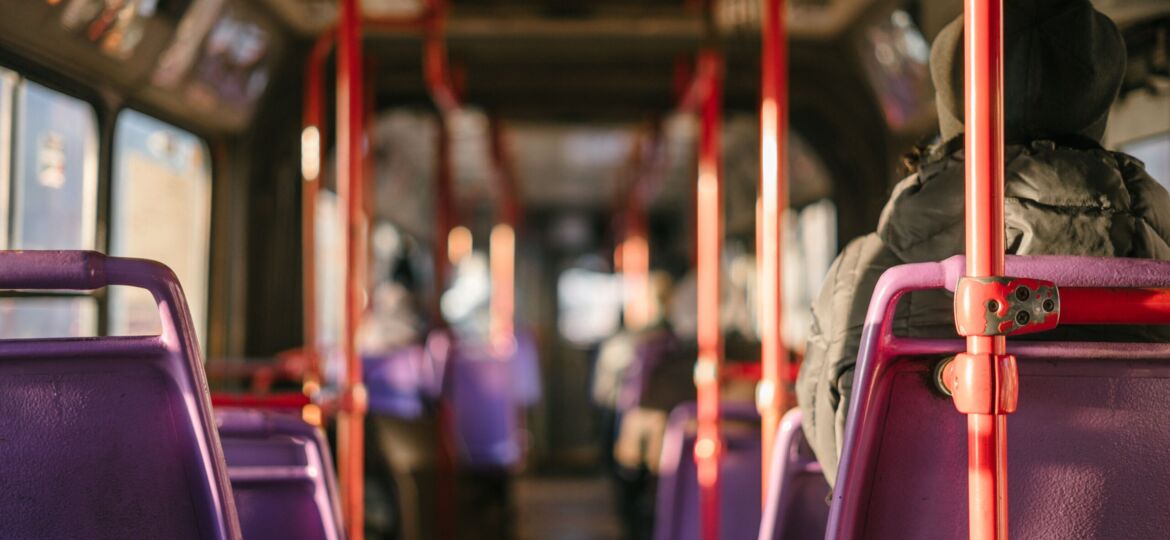 Interior view of passengers sitting on a bus