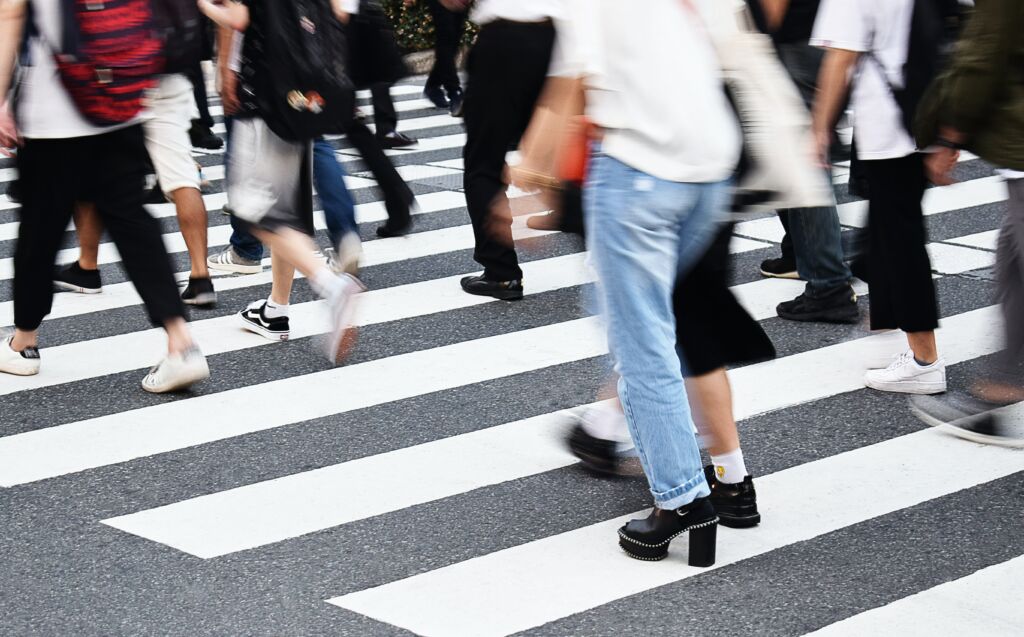 crowd crossing pedestrian crossing