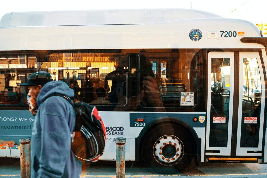 bus stopping for passengers in city