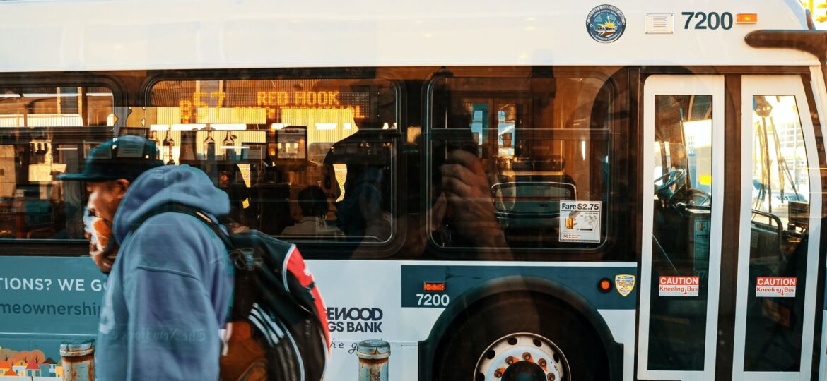 bus stopping for passengers in city