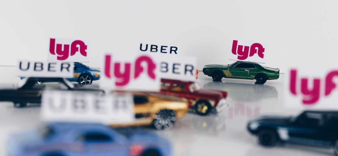 toy cars with uber and lyft flags