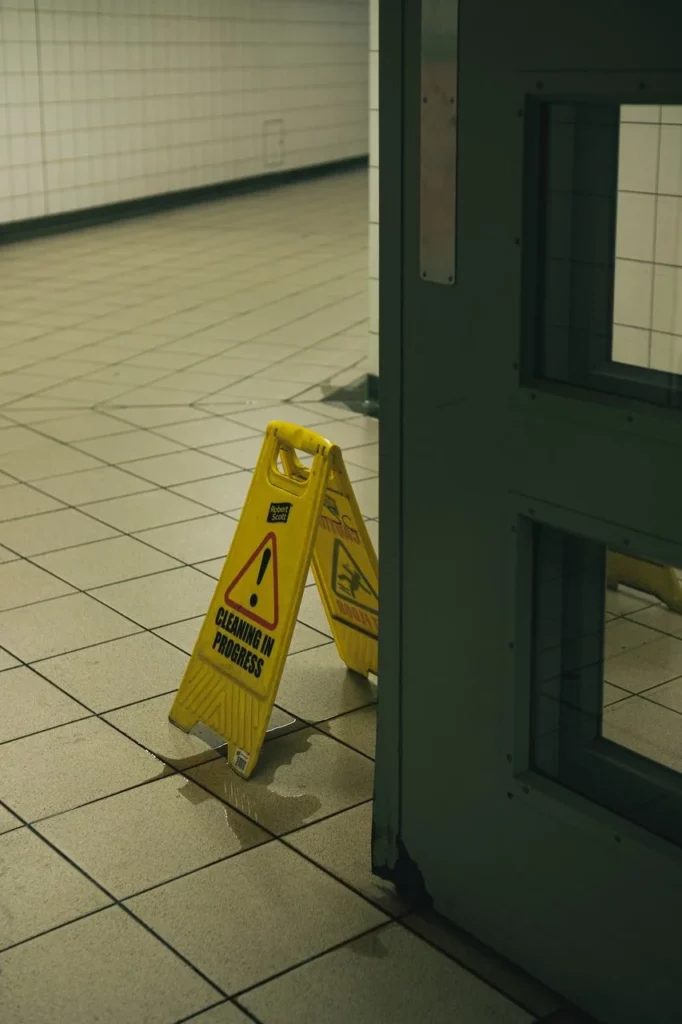 wet floor sign in doorway