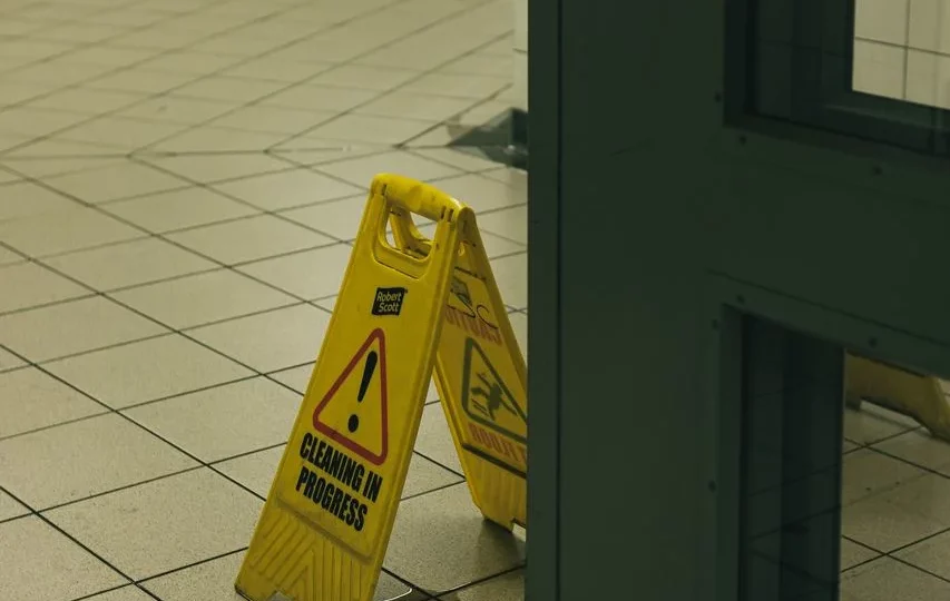 wet floor sign in doorway