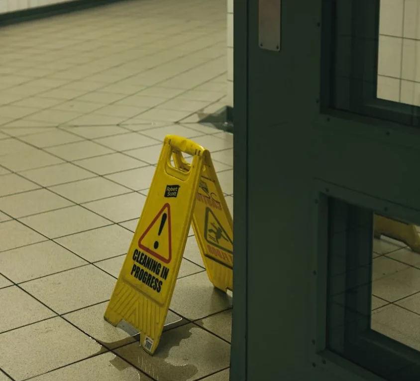 wet floor sign in doorway