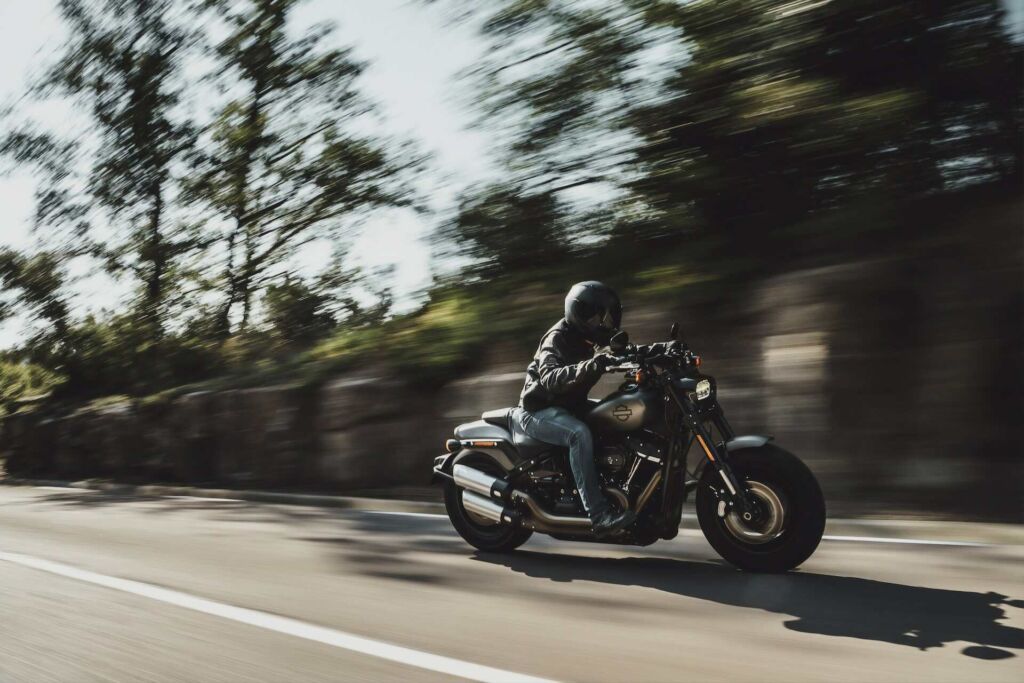 motorcycle driving fast on country road