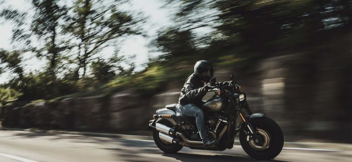 motorcycle driving fast on country road