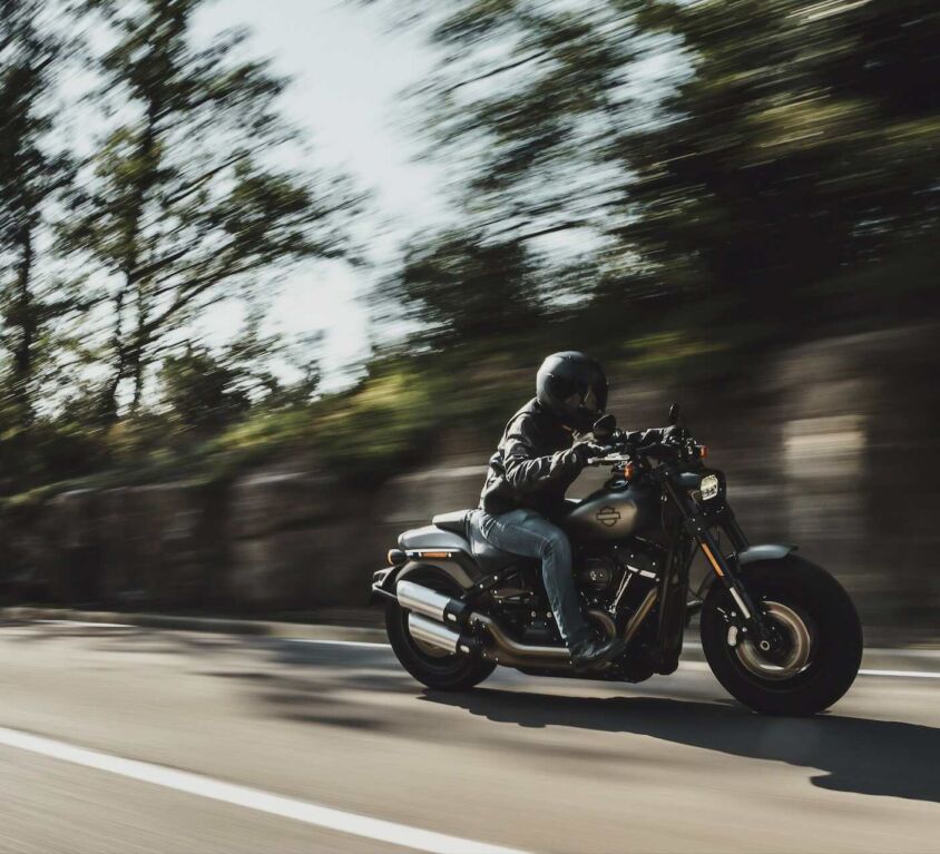motorcycle driving fast on country road