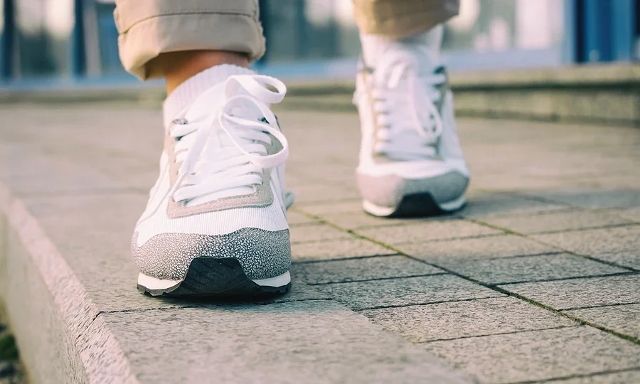 Person walking on pavement